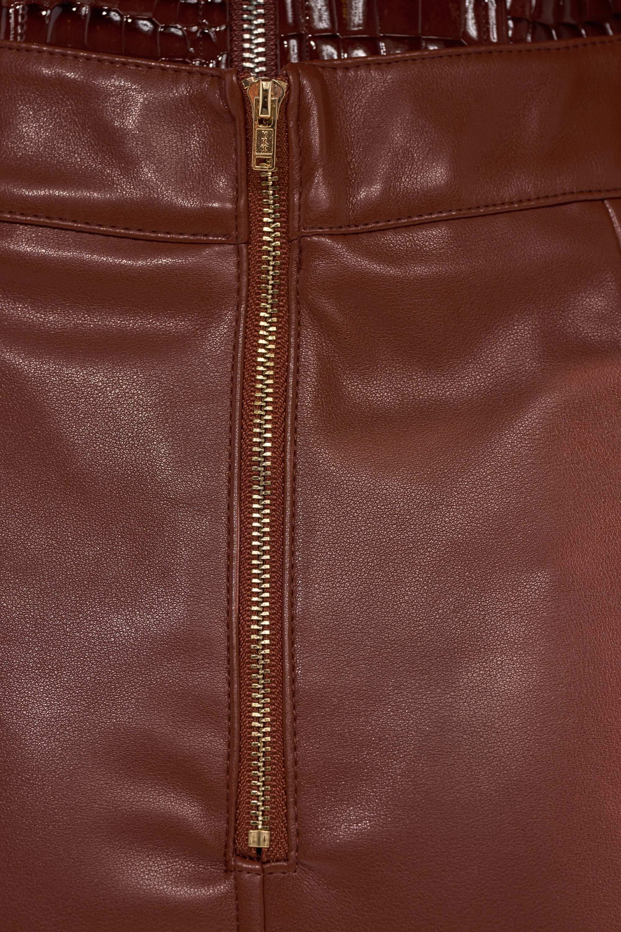 SOMETHING DIFFERENT FAUX LEATHER MIDI SKIRT